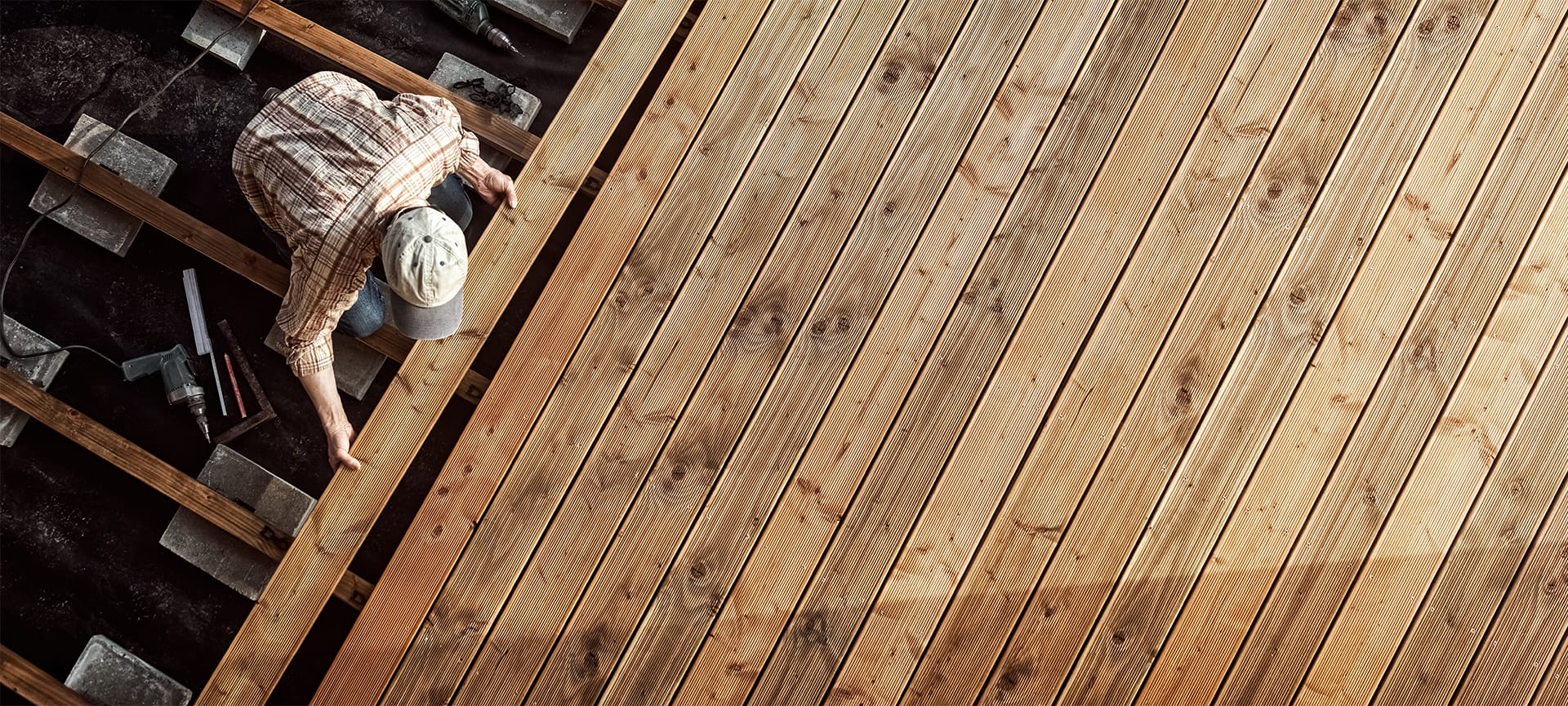 man building a deck