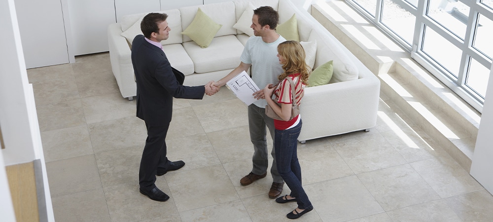 buyer taking house permit from seller