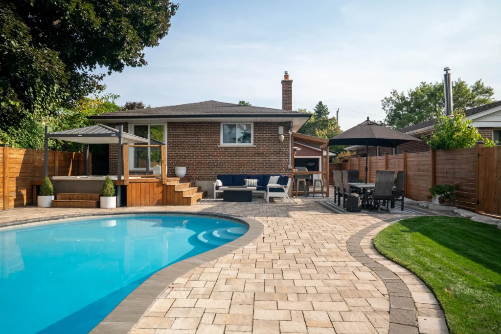 pool with paver deck and relaxing outdoor space