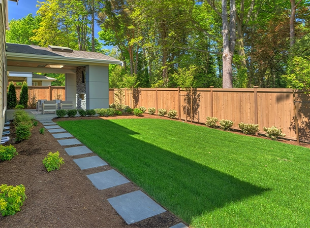 fence in backyard lawn