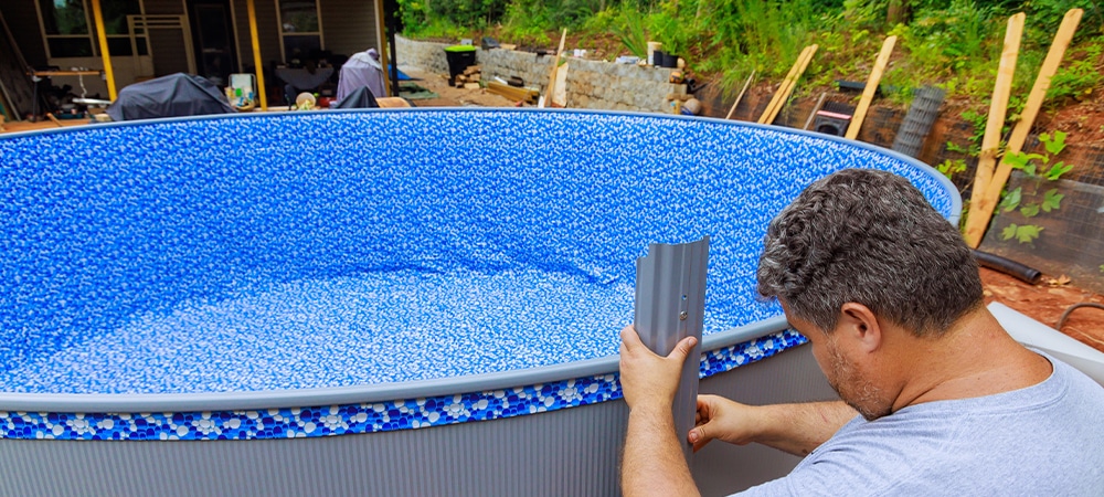 labour installing new above ground swimming pool