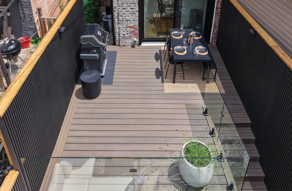 a beautiful trex deck designed and installed by a deck builder